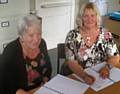 Lynda Robinson Chair of the Petrus Community & Babette Howard, Trustee  Chair of The Bond Board sign the Partnership Agreement