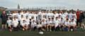 Participants line up on day one alongside St Helens RLFC Super League Trophy