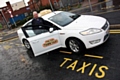 Taxi driver Keith Watson tries out the new rank