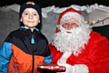 Declan Hilton met Father Christmas at the 2014 Springhill Hospice Christmas Fair