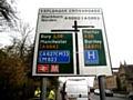 Filthy town centre road sign cleaned