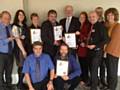 Nigel Morrell, Rochdale Township in Bloom Steering Committee Chairman, and other committee members receiving a number of awards including the overall silver gilt certificate for Rochdale Township