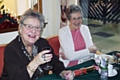 Doris Statham and Ann Flynn enjoying Brackenhall Court Christmas luncheon