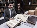 Seb Lassandro (Chairman of the Gracie Fields Appreciation Society) and Sarah Hodgkinson (Resource Officer-Museum) with the Gracie Fields scrapbooks