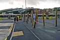 Poles between the market and adjacent car park