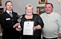 Sue Pickup receiving her a trophy and certificate awarded to her by Chief Superintendent Annette Anderson