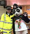 Chief Inspector Umer Khan from GMP Rochdale joins Constable Cub during the launch of the Blue Box at the Wheatsheaf