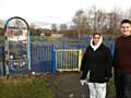 Councillor Amna Mir and local campaigner John Blundell inspect the abandoned children’s play area on the Cray in Firgrove