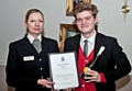 Chris Marland receiving his Rochdale Division Commander's Certificate from Chief Superintendent Annette Anderson