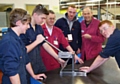 Rochdale Training apprentices construct a can crusher