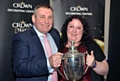 Crown Paints Managing Director Joe Devitt presents the award to Chrissie Blincoe 