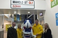 Hercules, the Rochdale Hornets mascot, presented tickets to youngsters at Mahdlo Junior Zone