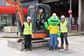 Kevin Brooks, demolition site manager, Rob Hamer – site supervisor (sitting in the truck), Springy the frog, the Springhill Hospice mascot, and Gareth Sharvin, demolition contractor