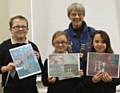 Heywood Lions President, Irene Sagar presents prizes at Harwood Park Primary