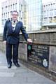 The Mayor on Lviv Bridge in the Centre of Rochdale in front of council headquarters Number One Riverside. The plaque was installed in 2002 and celebrates the 10th Anniversary of the twinning of both towns