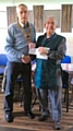 Past President Michael Fishwick presents the cheque to Iain Wight of Rochdale Foodbank 