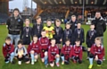 Youngsters from Hopwood Primary School and Whittaker Moss Primary School with their trophies