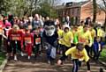 Rochdale AFC’s mascot, Desmond the Dragon, at the Rochdale Millipede Mile 