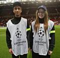 Hussain Rizvi (left) Metrolink flag bearer at Champion’s League match