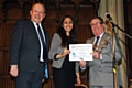 Young Person of the Year and winner of the Contribution to the Community award, Isha Khan presented with her awards by Mayor Peter Rush watched by MP Simon Danczuk