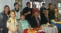 Students Emily Wright, Rachel Cullen, Nabil Adil, Jordan Anderson, Oliver Crossley, Hassan Arif, Maryam Arshad.  Front row: Amy Stevens, Sue Watson, Hopwood Hall College Deputy Principal John Spindler, Faculty Head Greg Scully and Jack Barnes