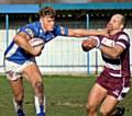 Paul Brearley hands off tackler