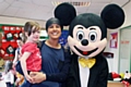 Imogen O'Brien, nursery manager Nadia Salim and Mickey Mouse