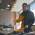 Zarka Hussain showing off her flambé skills