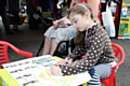 Olivia Roters enjoys colouring at the activity club