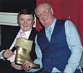 Eric Devereaux and Jimmy Cricket with the Golden Wellington Award 