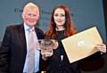 John Durcan, from the Emerson Educational Trust, presenting the Emerson Trust rose bowl to Danielle Wrigley