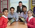 Year six students Muhammad Shaaref Rehman and Nimra Batool. Back row Saf Chaudry, who delivered the lesson on behalf of In2learn and Motahir Khan, year 6 teacher. Simon Moore, who will be the new head from September, stands at the back