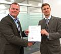 David Letts (left) receives his certificate from Laing O’Rourke managing director of Infrastructure Gary Wells