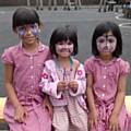 Zayna, Inayah and Alina – face painting with their painting faces 