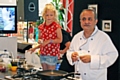 Millie Cluskey helping chef Aazam Ahmad