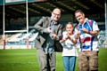 Hornets Director Martin Ballard with Mark Harris and Joining Jack Fundraiser, Millie Harris giving the 'Joining Jack' salute