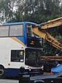 Crane crashes through bus window in Middleton