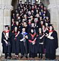 Hopwood Hall College students celebrating their success at the graduation ceremony held at Rochdale Town Hall