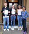 Conor Leyland, Rebecca Whitaker, Victoria Burnett and Maya Servio celebrate their GCSE success