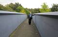 Councillor John Hartley at Greenvale Mill bridge after the clean up