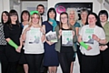 Staff from AST Hampsons wear green for Barnardo's