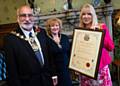 Mayor Surinder Biant and Mayoress Cecile Biant present Karen Johnson with her Mayoral commendation