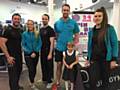 Customers and staff at Pure Gym Rochdale with six-year-old Annabelle Griffin