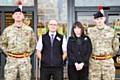 Jim Kenworthy, Damiam Hay store team manager, staff member Angie Coop and Cpl Sam Wilde