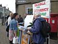 Peace Group members with supporters signing the CND petition at the stall on the corner of Church Street and Harehill Road, Littleborough