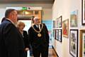 Veteran Darren Horsnell shows the Mayor and Mayoress around the exhibition at Touchstones