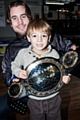 Four-year-old Isaac Journeaux with Martin Stapleton and his world title belt