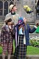 Caroline Kennedy and members of the group perform street theatre 