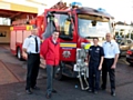 Rochdale Borough Manager Paul Starling, The Fire Fighters Charity Regional Fundraising Officer Northwest Alan Knell, Heywood Red Watch Firefighter Kate Lonsdale and Crew Manager Clayton Campbell