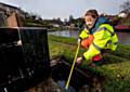 Canal & River Trust engineer Fran Littlewood surveys a canal sluice